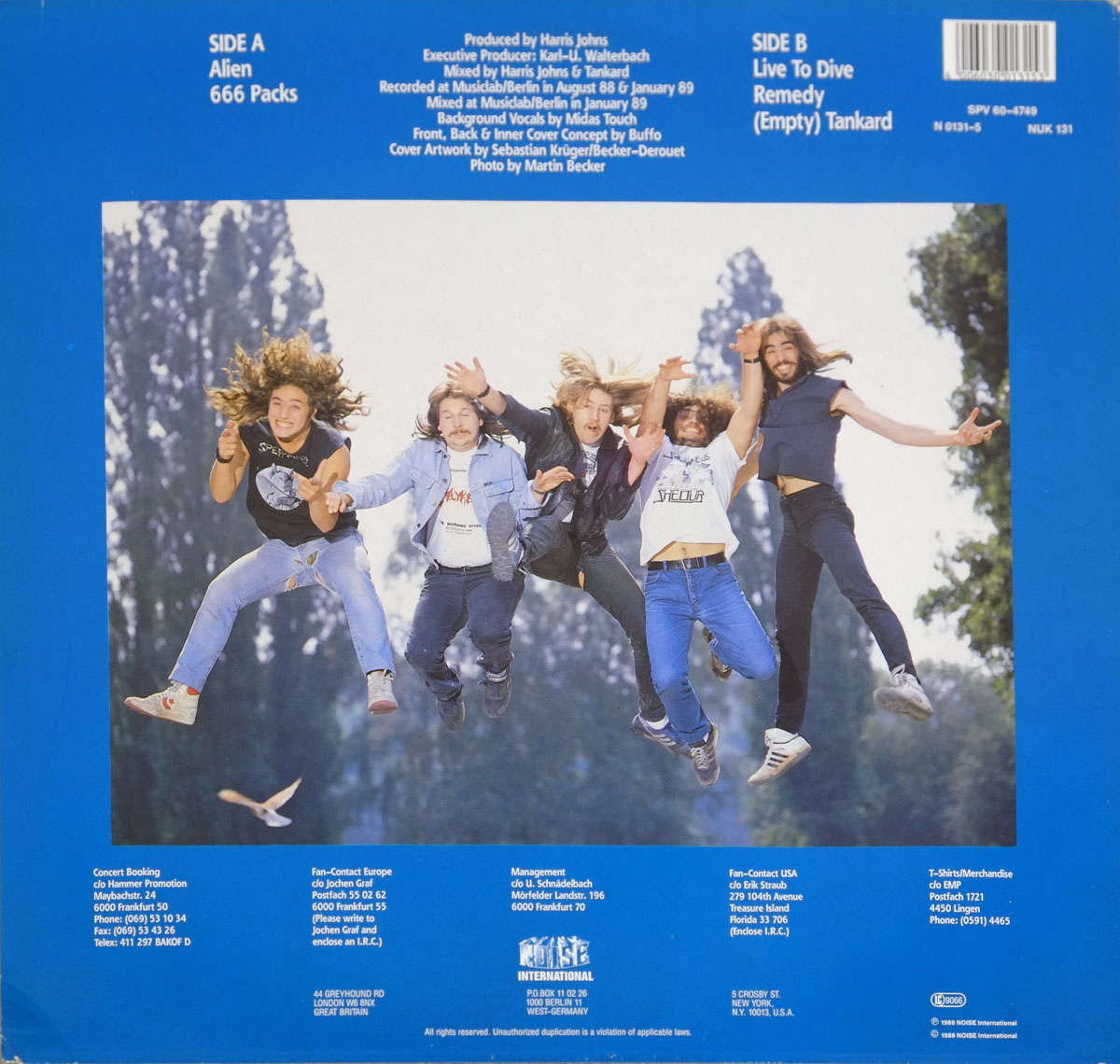 A photo of the Tankard band-members jumping in the air on the back cover of the Alien Album  